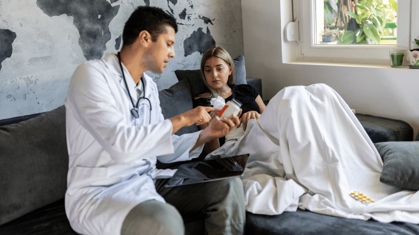 Medisense healthcare service provider, providing in-home medical checkup to a woman in Brisbane.