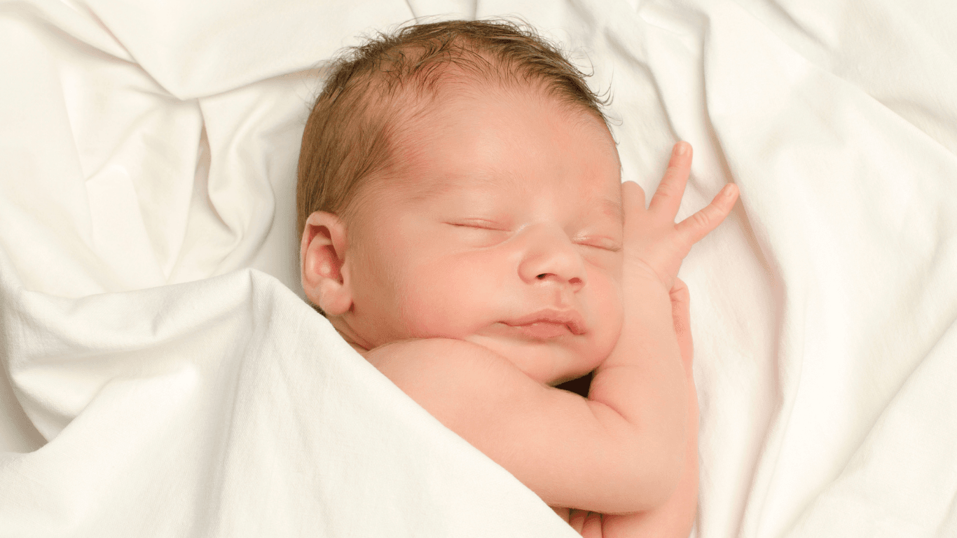 New born baby boy sleeping